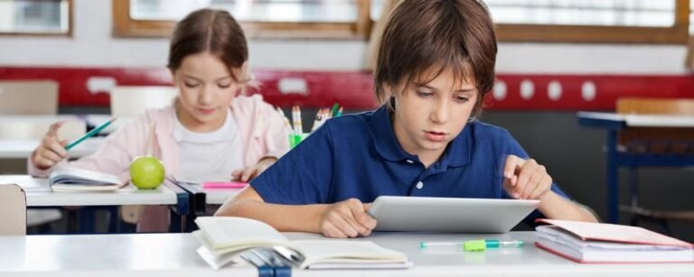 mp5161752-schoolboy-using-digital-tablet-in-classroom